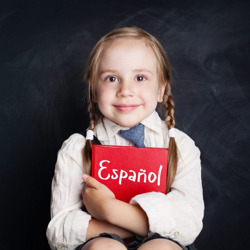 Kid,Learning,Spanish.,Little,Girl,With,Spanish,Book Kid,Learning,Spanish.,Little,Girl,With,Spanish,Book